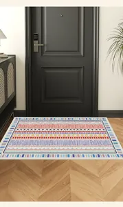 Bohemian geometric pattern entrance rug placed in a modern hallway setting