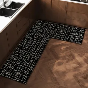 Tappeto da cucina nero a forma di L con motivo a griglia bianca per la protezione degli angoli