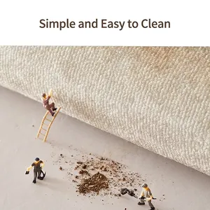 Gros plan d'un tapis beige texturé avec envers en TPR antidérapant pour entrée de maison