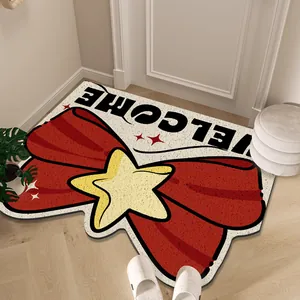 Decorative bow-shaped welcome doormat with red ribbon design and non-slip backing