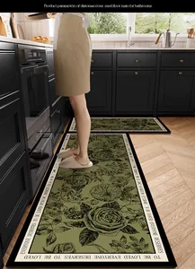 Detailed view of luxury green floral diatomaceous mud kitchen mat with non-slip backing