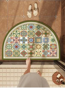 Detailed view of vintage bohemian tile pattern on semi-circular absorbent bath mat