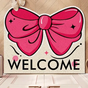 Cute pink bow welcome doormat made of PVC wire loop for home entrance.