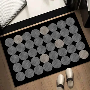 Tappetino da bagno assorbente in fango di diatomee nero con elegante motivo a cerchi grigi