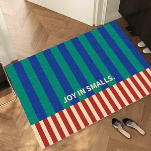 Vintage blue and green striped non-slip PVC doormat featuring Joy in Smalls quote