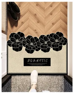 Vista detallada de un felpudo de entrada antideslizante con diseño floral francés