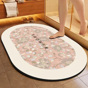 Minimalist oval floral absorbent bathroom floor mat with 'SHOWER' print for quick drying
