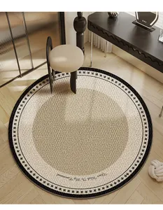 Modern round velvet rug in a chic dressing room setting with elegant cursive print