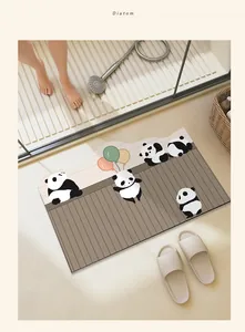 Cute panda cartoon diatomaceous earth bath mat shown in a modern bathroom setting