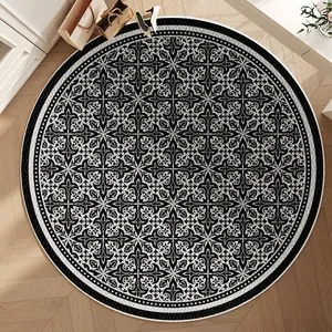Luxurious round Belgian velvet rug featuring elegant black and white mandala pattern