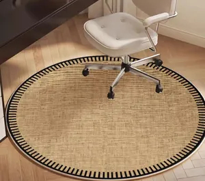 Close-up of a round woven chair mat with black and white striped border on wooden floor