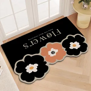 Modern black entry doormat featuring floral design and non-slip silk loop texture for indoor use