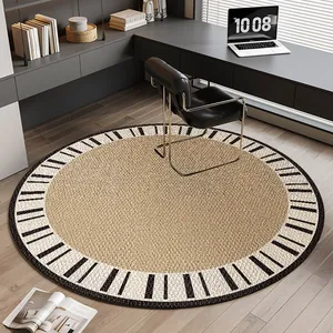 Modern round area rug featuring a piano key border for home office or bedroom decor