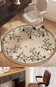 Vintage round office chair mat with branch and butterfly pattern on wooden floor
