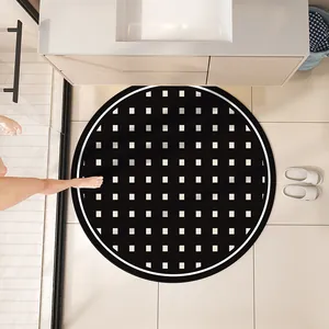 Modern round bathroom mat with black and white checkered pattern, non-slip floor carpet.