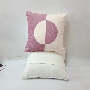 Detail of purple geometric circle pillow cover featuring an envelope back closure