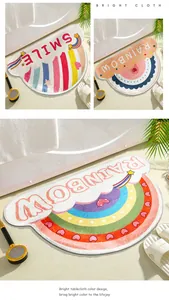 Absorbent semi-circle bath mats with rainbow and smile designs for bathroom decor
