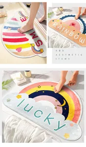 Close-up of soft faux cashmere bath mat with colorful rainbow and lucky text