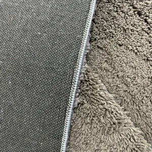 Detailed close-up of shaggy cake velvet rug showing texture and durable woven backing