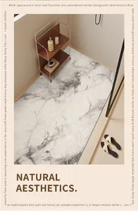 Close-up detail of the gray marble texture on the non-slip PVC shower floor mat.