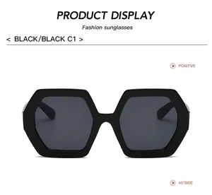 Detailed front view of oversized hexagonal retro sunglasses with a black frame finish