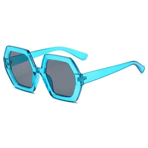 Retro oversized hexagonal sunglasses with blue translucent frames and dark grey lenses
