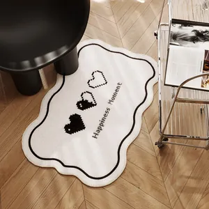 Tapis moderne en imitation cachemire avec motif cœur en noir et blanc