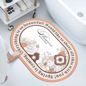 Floral soft diatom mud absorbent bath mat in a minimalist white bathroom setting.
