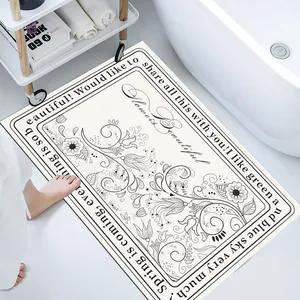 Functional bathroom scene showing a floral absorbent diatomaceous earth bath mat by a tub