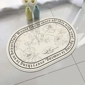 Oval lamb velvet bathroom mat featuring a floral design and inspirational English text.