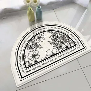 Semi-circular lamb velvet bath mat with floral pattern and inspirational quote details.