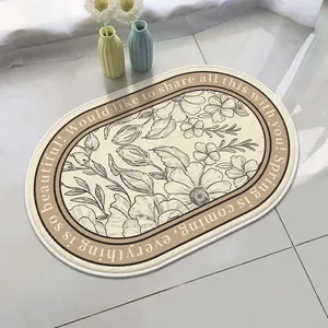 Detailed view of an oval lamb velvet bath mat with a floral pattern and English text