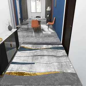 Tapis d'entrée intérieur moderne avec motifs abstraits de vagues or et bleu