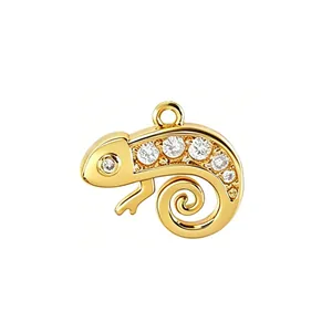Detailed view of a gold-plated chameleon charm with sparkling zircon inlays for jewelry making