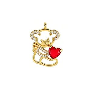 Macro detail of a gold-plated bear pendant holding a brilliant red heart-shaped zircon