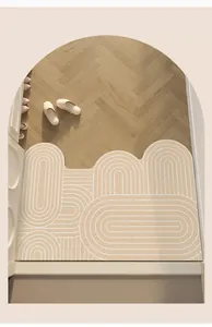 Détail du paillasson en PVC crème au design géométrique minimaliste et abstrait.