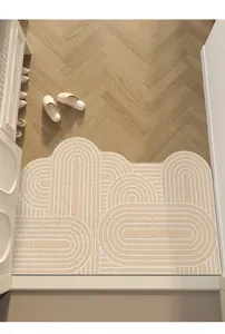 Tapis d'entrée de style crème avec motif d'arche géométrique et boucles en PVC