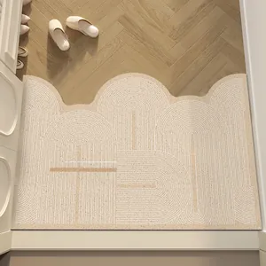 Paillasson en PVC crème à bord festonné et motifs géométriques pour entréeons