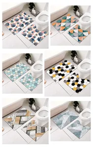 Detail view of 6 varied geometric pattern bathroom mat sets including U-shaped toilet rugs.