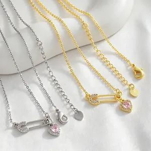 Colliers épingle à nourrice élégants avec pendentif cœur en zircon rose, or et argent