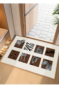Close-up of Belgian velvet entrance door mat with artistic zebra and palm tree prints