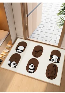 Close-up of cream-colored door mat with panda and bamboo patterns in an entrance hall