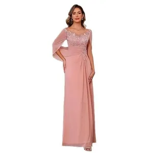 Elegant dusty pink chiffon evening gown with lace appliques and cape sleeves.