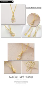 Detail view of gold-plated girl pendant necklace with micro-paved cubic zirconia stones