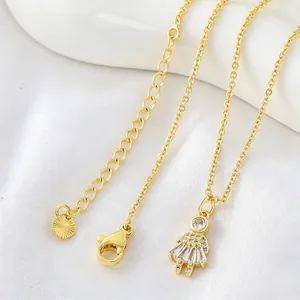 Gold plated necklace featuring a cute little girl pendant with sparkling zircon inlays