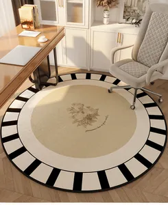 Vintage round Dornier rug with a floral center and black-and-white striped border design