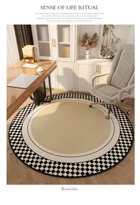Luxury vintage round rug featuring a checkerboard border in a cozy home office setting.