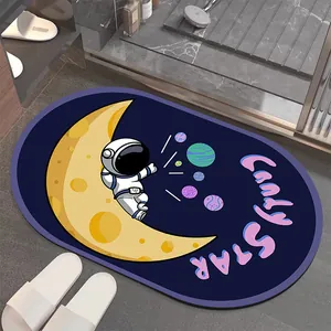 Detailed view of a non-slip diatom mud bathroom mat with cute astronaut cartoon design