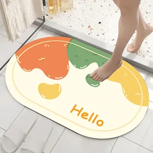 Detail view of a soft diatom mud bathroom mat with colorful cartoon design and Hello text