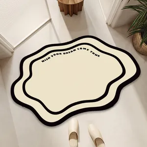 Tapis de bain irrégulier en cuir absorbant en forme de nuage crème et noir pour la maison